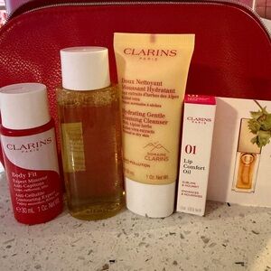 Clarins Skincare Set with Red Clarins cosmetic bag